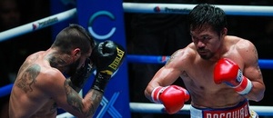Manny Pacquiao v duelu s Lucasem Matthyssem - Zdroj FARYSA HAMZAH, Shutterstock.com Manny Pacquiao v duelu s Lucasem Matthyssem - Zdroj FARYSA HAMZAH, Shutterstock.com