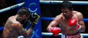 Manny Pacquiao v duelu s Lucasem Matthyssem - Zdroj FARYSA HAMZAH, Shutterstock.com Manny Pacquiao v duelu s Lucasem Matthyssem - Zdroj FARYSA HAMZAH, Shutterstock.com
